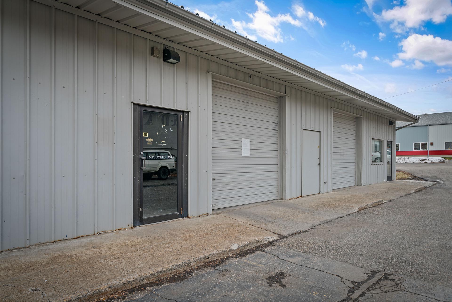 retail industrial warehouse for lease 514 w aspen bozeman mt exterior doors endstate commercial partners